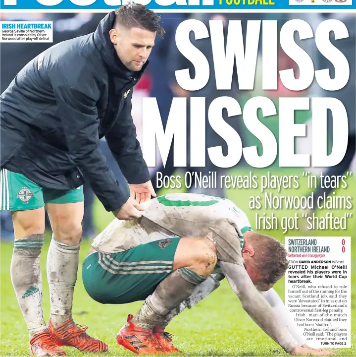  ??  ?? IRISH HEARTBREAK George Saville of Northern Ireland is consoled by Oliver Norwood after play-off defeat