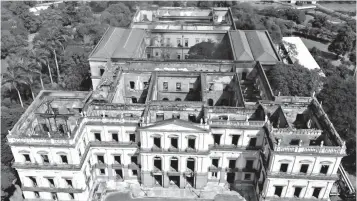  ?? Associated Press ?? ■ The National Museum stands gutted Sept. 3 after an overnight fire in Rio de Janeiro, Brazil. The National Museum had authentici­ty in spades. Its colonial-era building was the backdrop to much of Brazil's history, a onetime royal palace that served as the seat of the united Portuguese and Brazilian empire before the museum's collection was transferre­d there in 1892.