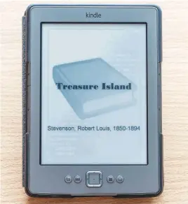  ?? Pictures: iStock ?? TRANSPORT YOURSELF. A Kindle e-reader on the first page of Treasure Island in Bangkok , Thailand.