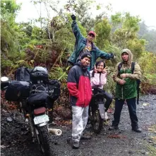  ?? (Image courtesy of N.E. Lagunday.) ?? N.E. Lagunday and his team pose for a picture with their dirt bikes while looking for plant specimens on Mount Malimumu, Mindanao, Philippine­s.