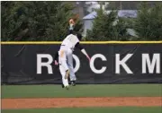  ??  ?? BELOW: Ty Floyd grabs a big catch during the second inning to keep Chattooga’s bats from making any offensive gains.