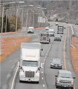  ?? H John Voorhees III/Hearst Connecticu­t Media ?? Street lights along a section of Route 7 in Brookfield. Due to multiple accidents in a section along Route 7 in New Milford, local leaders are pushing for a state bill that would bring additional lighting from the area near New Milford High School up to Veterans Bridge.