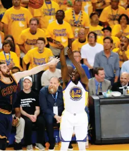  ?? (Reuters) ?? GOLDEN STATE WARRIORS forward Draymond Green (23) hits one of his five three-pointers on Sunday night against the Cleveland Cavaliers in Game 2 of the NBA Finals. It was Green’s turn on the Warriors’ rotating carousel of stars, as he put up a game-high...