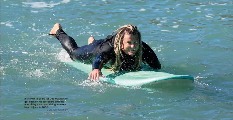  ?? MARK TAYLOR/STUFF ?? It’s taken 15 years for Olly Mathers to get back on his surfboard after he was hit by a car, sustaining a severe head injury, in 2006.