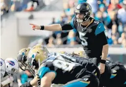  ?? SCOTT HALLERAN/GETTY IMAGES ?? Jaguars QB Blake Bortles, who starred at UCF, says signing a second contract with the team that drafted him was his goal all along. He’s set to make $54 million through 2020.