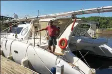  ??  ?? Bernard Lasporte waits for the canal system to open on his boat, the Tia Matou, at the Waterford dock Friday.