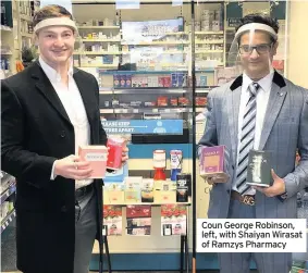  ??  ?? Coun George Robinson, left, with Shaiyan Wirasat of Ramzys Pharmacy