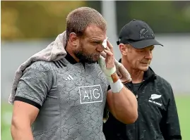  ?? GETTY IMAGES ?? Joe Moody is assisted by Dr Tony Page after suffering a bad cut to an eye during an All Blacks training session last November in London.