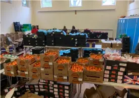  ??  ?? The Grub Club shares surplus food with the Norreys community