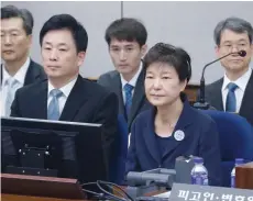  ?? — AFP ?? Former South Korean president Park Geun-Hye (R) attends her trial at the Seoul Central District Court in Seoul.