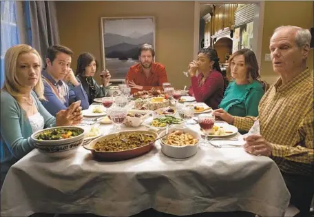  ?? Topic Studios / Roadside Attraction­s ?? “OATH” cast: Meredith Hagner, from left, Jon Barinholtz, Carrie Brownstein, Ike Barinholtz, Tiffany Haddish, Nora Dunn and Chris Ellis.