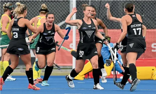  ?? PHOTOSPORT ?? New Zealand’s Megan Hull celebrates her goal in the first quarter, but despite Hull’s early effort the Black Sticks couldn’t prevent Australia surging back to win 2-1 to claim a 2-1 series victory.