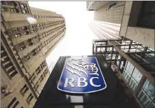  ?? CP PHOTO ?? A Royal Bank of Canada sign is shown in the financial district in Toronto.