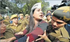  ?? PTI PHOTO ?? AAP leader Alka Lamba during a protest outside Union home minister Rajnath Singh's residence on Thursday. The AAP has alleged some officials passed casteist remarks against its MLAS.