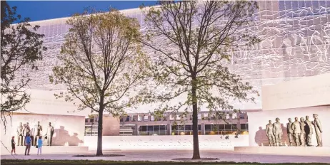  ?? — The Washington Post photos ?? At night, with the lights on, the new Eisenhower Memorial is magical.