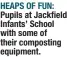  ?? ?? HEAPS OF FUN: Pupils at Jackfield Infants’ School with some of their composting equipment.