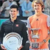  ??  ?? Alexander Zverev (right) poses with Novak Djokovic after beating him 64, 63 in the final of the Italian Open meet in Rome on Sunday. This is Zverev’s first ATP title.