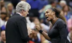  ?? ADAM HUNGER — THE ASSOCIATED PRESS FILE ?? Serena Williams, right, talks with referee Brian Earley during the women’s final of the U.S. Open in New York.