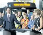  ?? NATHAN DENETTE/CANADIAN PRESS ?? Prime Minister Justin Trudeau, left, makes an announceme­nt with Ontario Premier Kathleen Wynne regarding new funding for transit in Barrie, Ont., on Tuesday.