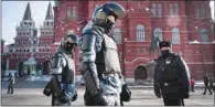  ?? (AFP) ?? Russian riot police patrol in downtown Moscow recently.