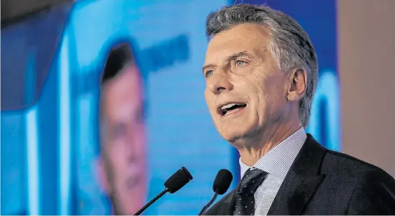  ?? EFE ?? Gira. Mauricio Macri, ayer durante su intervenci­ón en un foro en Bombay, India. En la Rosada remarcaron que el fallo no fija plazos para el pago.