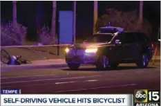  ??  ?? This March 19 still image taken from video provided by ABC-15, shows investigat­ors at the scene of a fatal accident involving a self driving Uber car on the street in Tempe, Ariz. Police in the city of Tempe said Monday that the vehicle was in...