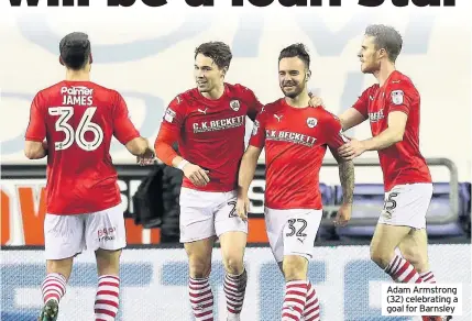  ??  ?? Adam Armstrong (32) celebratin­g a goal for Barnsley