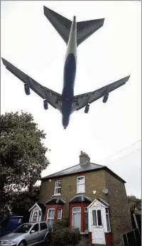  ??  ?? A plane coming into land at Heathrow – many residents are concerned another runway will mean more noise and pollution Dan Kitwood/Getty Images