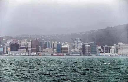  ?? PHOTO: MAARTEN HOLL/FAIRFAX NZ ?? What a difference a few hours make ... Wellington’s weather, as seen from Mt Victoria yesterday morning.