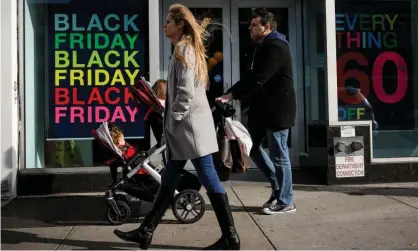  ?? Photograph: Brendan McDermid/Reuters ?? Holiday shoppers take part in Black Friday sales in Brooklyn, New York, on 29 November.