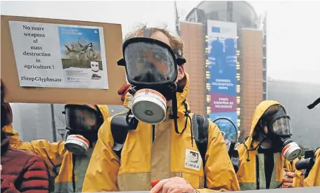  ?? Picture: Olivier Hoslet/EPA/REX/Shuttersto­ck. ?? A protest against glyphosate use is held at Schuman Square, near the European Institutio­n headquarte­rs in Brussels.