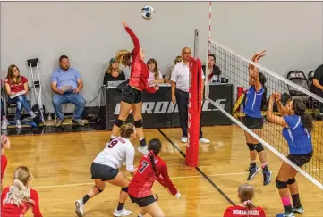  ?? Cory Rubin/The Signal (See additional photos on signalscv.com) ?? Cardinals senior Aaronya Crosswhite goes up for the kill in a playoff matchup with Littlerock at SCCS Tuesday night. SCCS won in three sets: 25-6, 25-18, 25-13 and advances to the first-round of CIF-SS Division 8 playoffs.