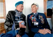  ?? PHOTO: REUTERS ?? Soviet veteran Gennady Yermolin, left, and British veteran Seymour Taylor chat during the commemorat­ions of the 75th anniversar­y of the arrival of the first allied Arctic Convoy at Arkhangels­k in World War II.