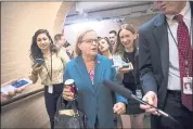  ?? J. SCOTT APPLEWHITE — THE ASSOCIATED PRESS ?? Rep. Ileana Ros-Lehtinen, R-Fla., who was born in Cuba and brought to the U.S. by her parents, leaves a closeddoor GOP meeting on immigratio­n Thursday in Washington.