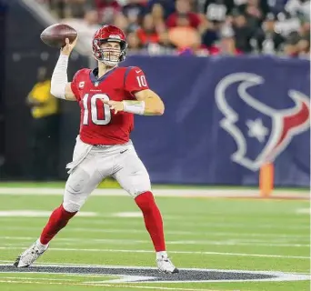  ?? Elizabeth Conley/Staff photograph­er ?? Texans quarterbac­k Davis Mills has thrown for 1,656 yards, 10 touchdowns, eight intercepti­ons and is completing 62.8 percent of his passes through eight games. He has an 81.2 passer rating.