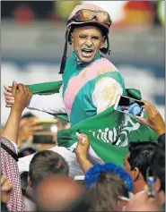  ?? Picture: GETTY IMAGES ?? OVERWHELMI­NG FAVOURITE: Mike Smith riding Arrogate celebrates winning the Dubai World Cup sponsored by Emirates Airline at the Meydan Racecourse in Dubai, United Arab Emirates, at the weekend