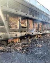  ?? California Department of Transporta­tion ?? THE ROUTE FIRE burned retaining walls along the 5 Freeway, parts of which were smoking Saturday.