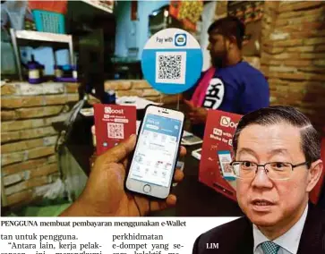  ??  ?? PENGGUNA membuat pembayaran menggunaka­n e-Wallet
LIM