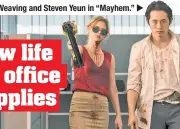  ??  ?? Samara Weaving and Steven Yeun in “Mayhem.”