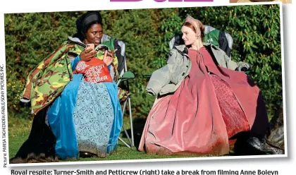  ??  ?? Royal respite: Turner-Smith and Petticrew (right) take a break from filming Anne Boleyn