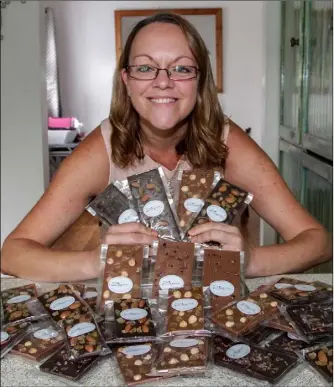  ??  ?? Leigh Kelly with her Zaeire Chocolates at her chocolate factory in Murrintown.