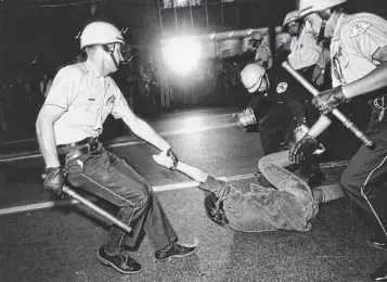  ?? BARTON SILVERMAN New York Times file ?? Police detain a demonstrat­or during the Democratic National Convention in August 1968. Mayor Brandon Johnson has stressed that this is not the same Chicago as the one that erupted into chaos during the DNC convention in 1968.