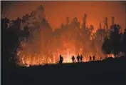  ?? Matias Delacroix Associated Press rages near Puren, Chile, on Saturday. ??