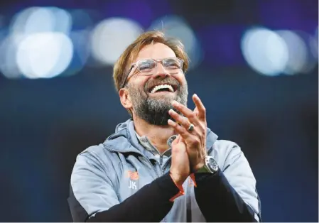  ?? GETTY IMAGES ?? Panacea: With his grizzly warmth and booming laughter the fun and pleasure that flows through Jurgen Klopp’s body and onto the Anfield pitch is the tonic a city needs.