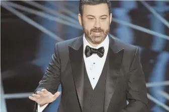  ?? AP PHOTOS ?? AND THE AWARD GOES TO ... : Host Jimmy Kimmel, above, speaks at the Oscars last night at the Dolby Theatre in Los Angeles.