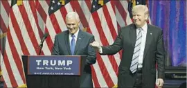  ?? Jason Szenes European Pressphoto Agency ?? IN THEIR FIRST joint appearance, Donald Trump dominated the event before yielding the stage to his vice presidenti­al choice, Indiana Gov. Mike Pence.