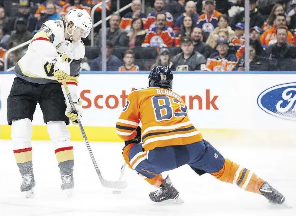  ?? GETTY IMAGES ?? Oilers defenceman Matt Benning tries to stop William Karlsson of the Golden Knights during action on Thursday night at Rogers Place.