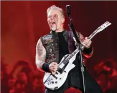  ??  ?? James Hetfield of Metallica performs with the band in 2015.