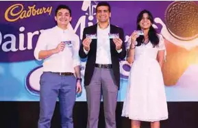  ??  ?? (From left) Cadbury category manager Nikhil Nicholas, SEA Chocolate associate director Vikram Karwal and Cadbury brand manager Nisha Nair at the Cadbury Dairy Milk Oreo launch yesterday.