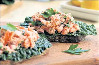  ?? COURTESY OF LYNDA BALSLEV ?? Topped with hot-smoked salmon, which is flakier and smokier than the cold-smoked version, these tartines are healthy, easy and elegant.